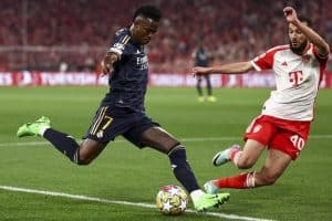 Read more about the article Vinicius’ double earns Real draw at Bayern